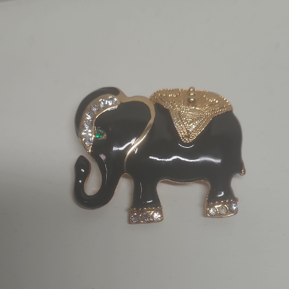 Elegant Black Elephant Brooch with Gold Accents